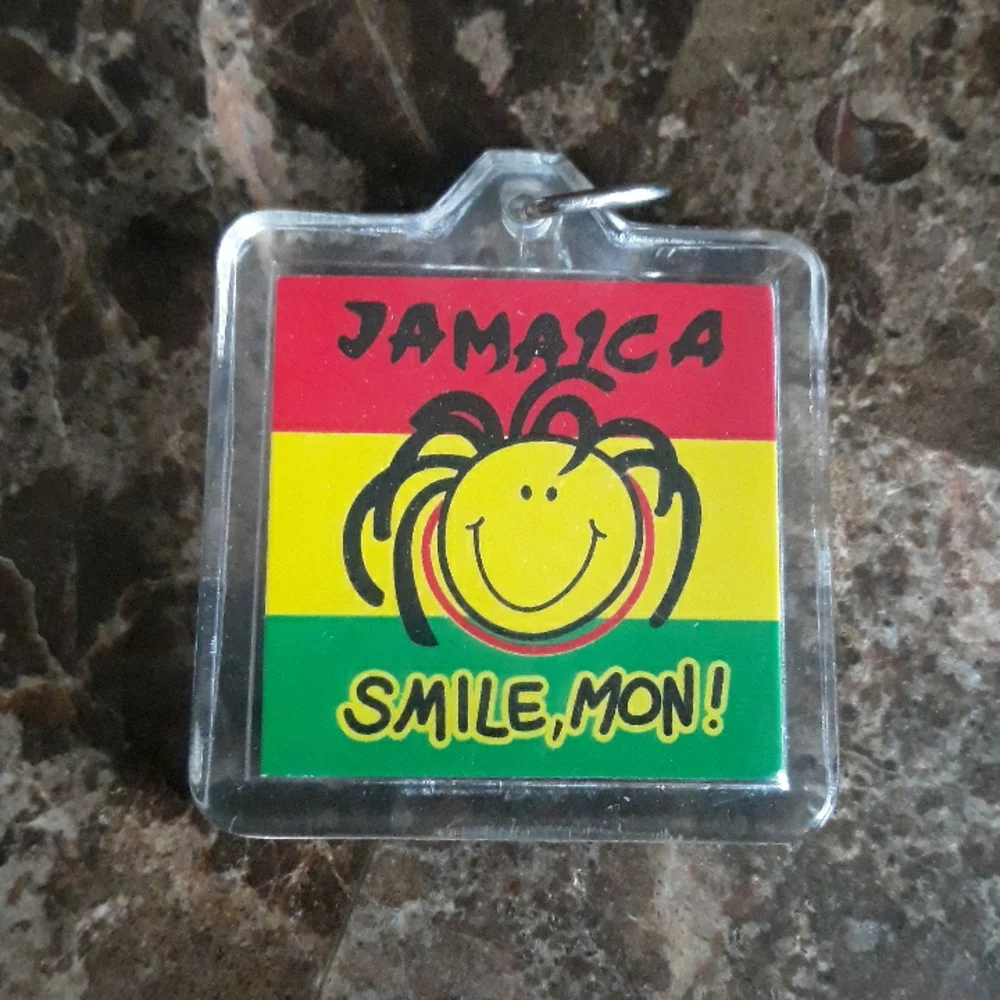 Jamaica Smile, Mon! Keychain. 1.5 inches by 1.5 inches plastic with metal ring